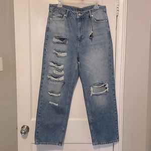 Distress denim blue jeans